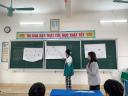 hs lên bảng thuyết trình.jpg - 